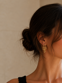 Boucle d'oreilles noeuds nautiques dorées