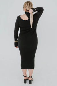 Robe midi noire côtelée Victoria par Anine Bing, manches longues, coupe moulante bodycon, détails en découpes vue de dos