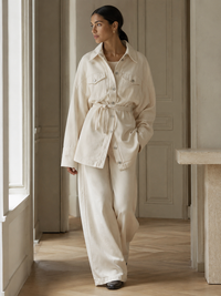 Veste Sportmax Biblios écru vue de côté — tombé naturel du denim avec ouverture signature en bas de la veste, tailles L et XL disponibles_editorial