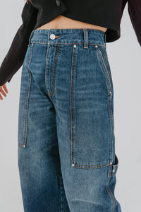 Jeans carpenter bleu foncé Stella McCartney, coupe jambe large, style workwear vintage, denim structuré - détail poche avant