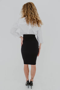 Jupe crayon noire Ottoman par Wolford, tricot côtelé texturé, taille haute, coupe ajustée élégante vue de dos